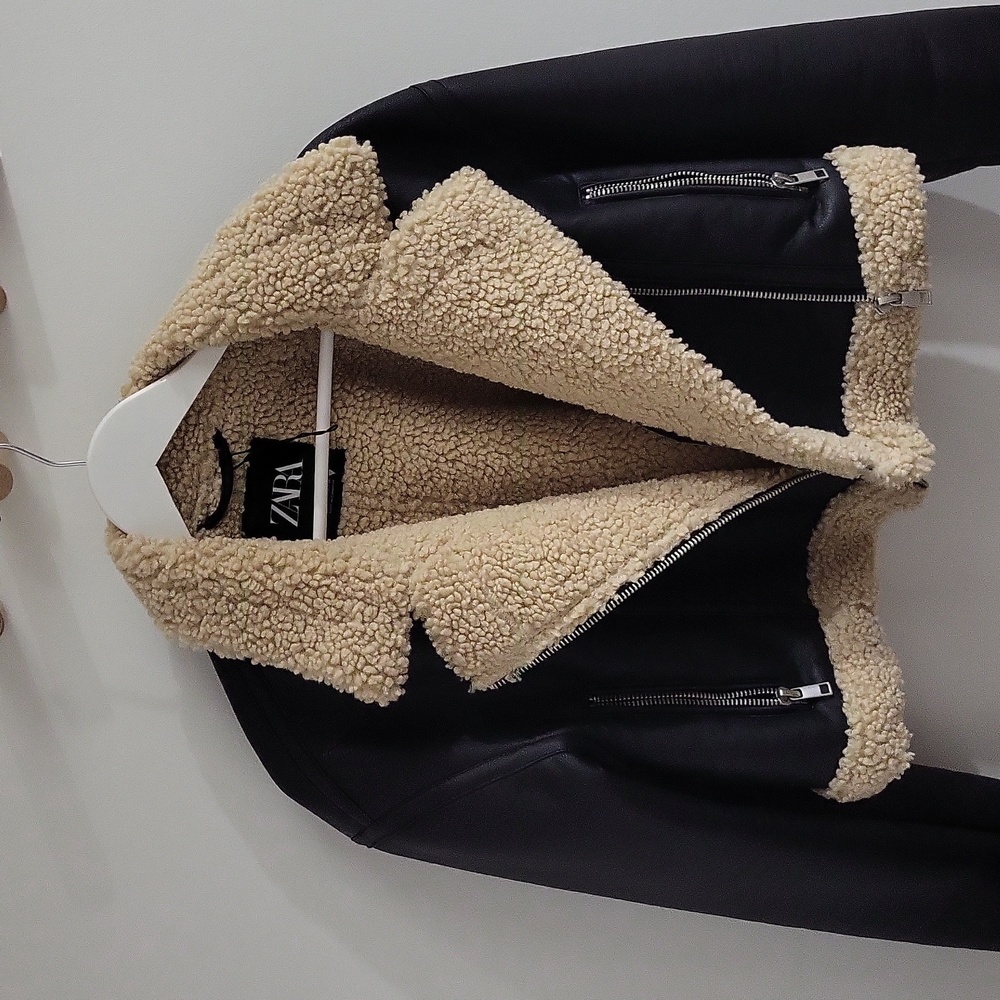 Trendy sherpa lined faux leather crop jacket.